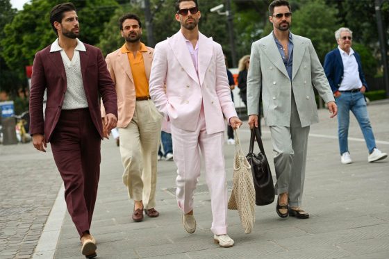 4 stylish men walking the streets of Florence during Pitti Uomo